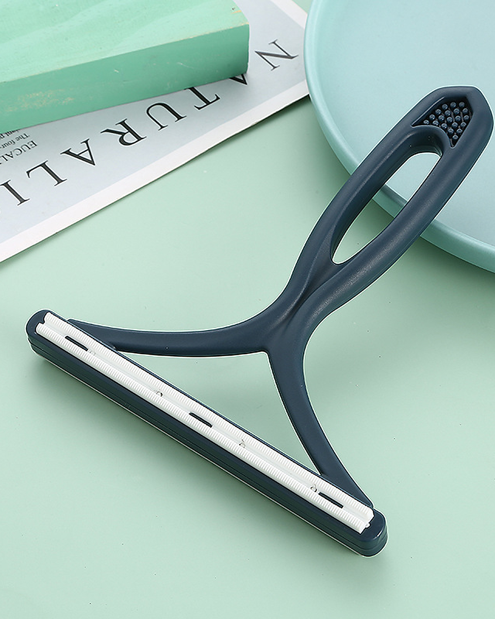 Fabric shaver in dark blue